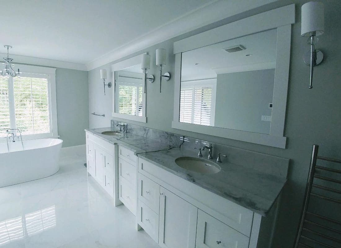 Marble-look vanity with framed mirror