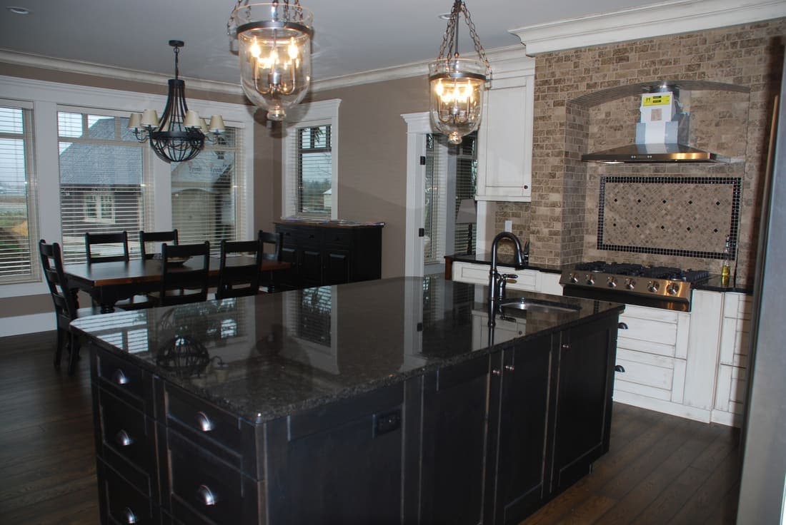 Dark island with statement pendant lights